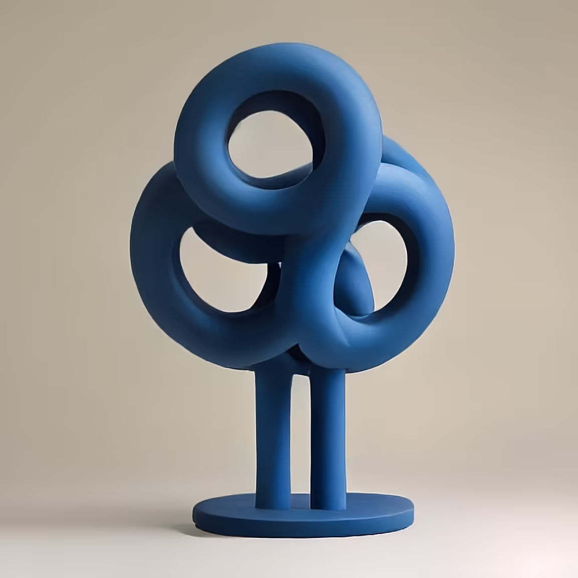 A blue sculpture on a white table