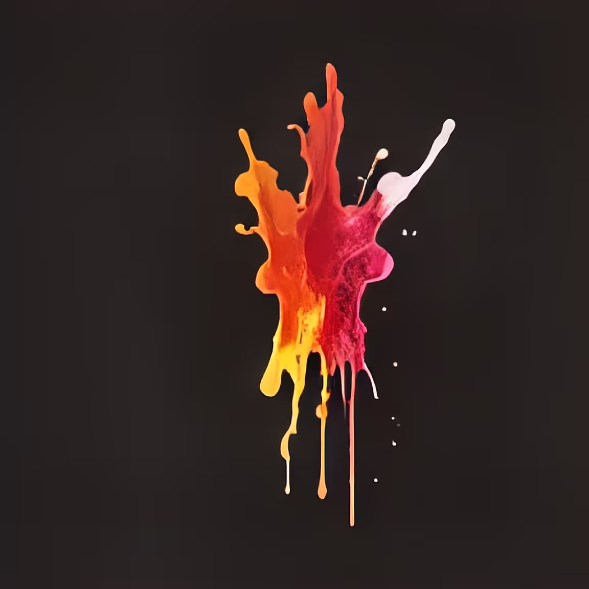 Red, yellow, and orange paint splattered on a black background
