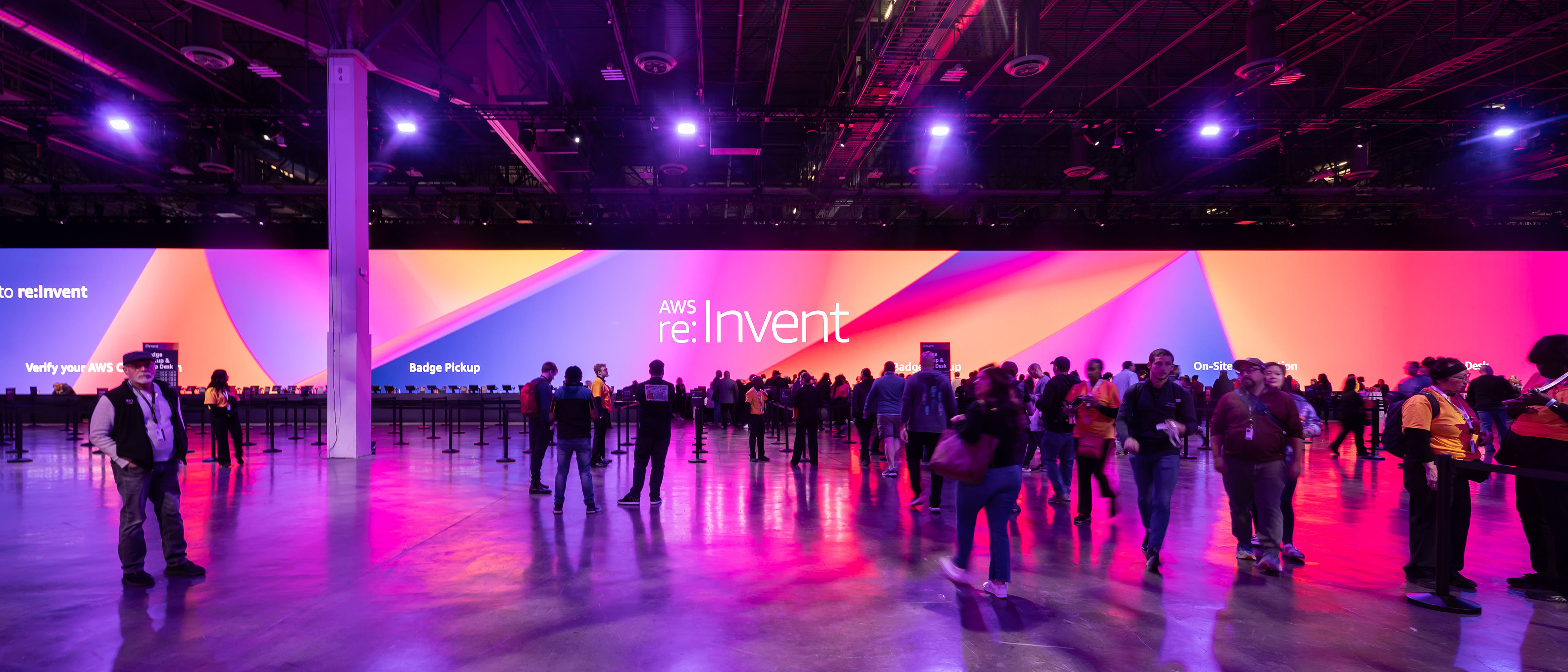 aws reinvent gradient wall badge pickup