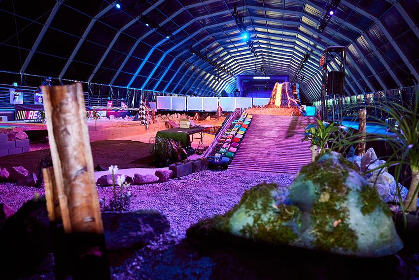 The RC Racers track from the sidelines, planting and rockwork along the course