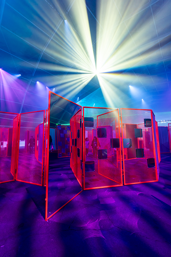 The red mesh Labyrinth beneath a white starburst light