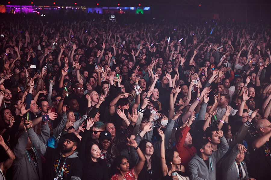 A large crowd of people at a concert.