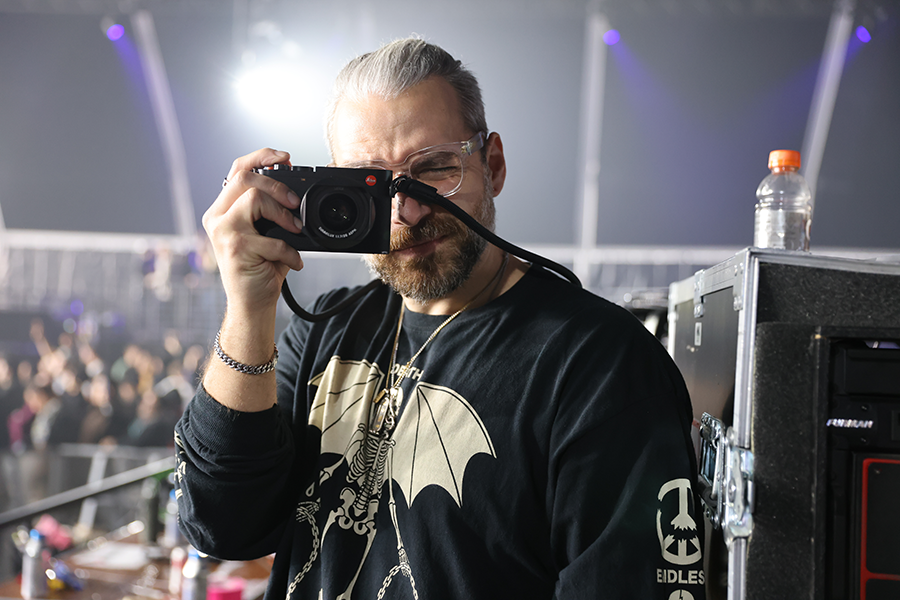 A man taking a picture of himself with a camera.