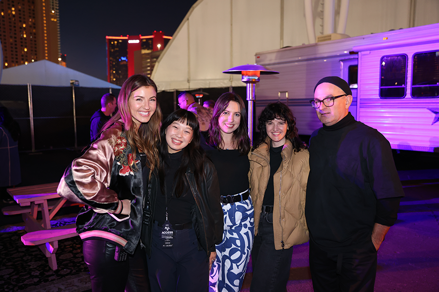 A group of people standing next to each other.