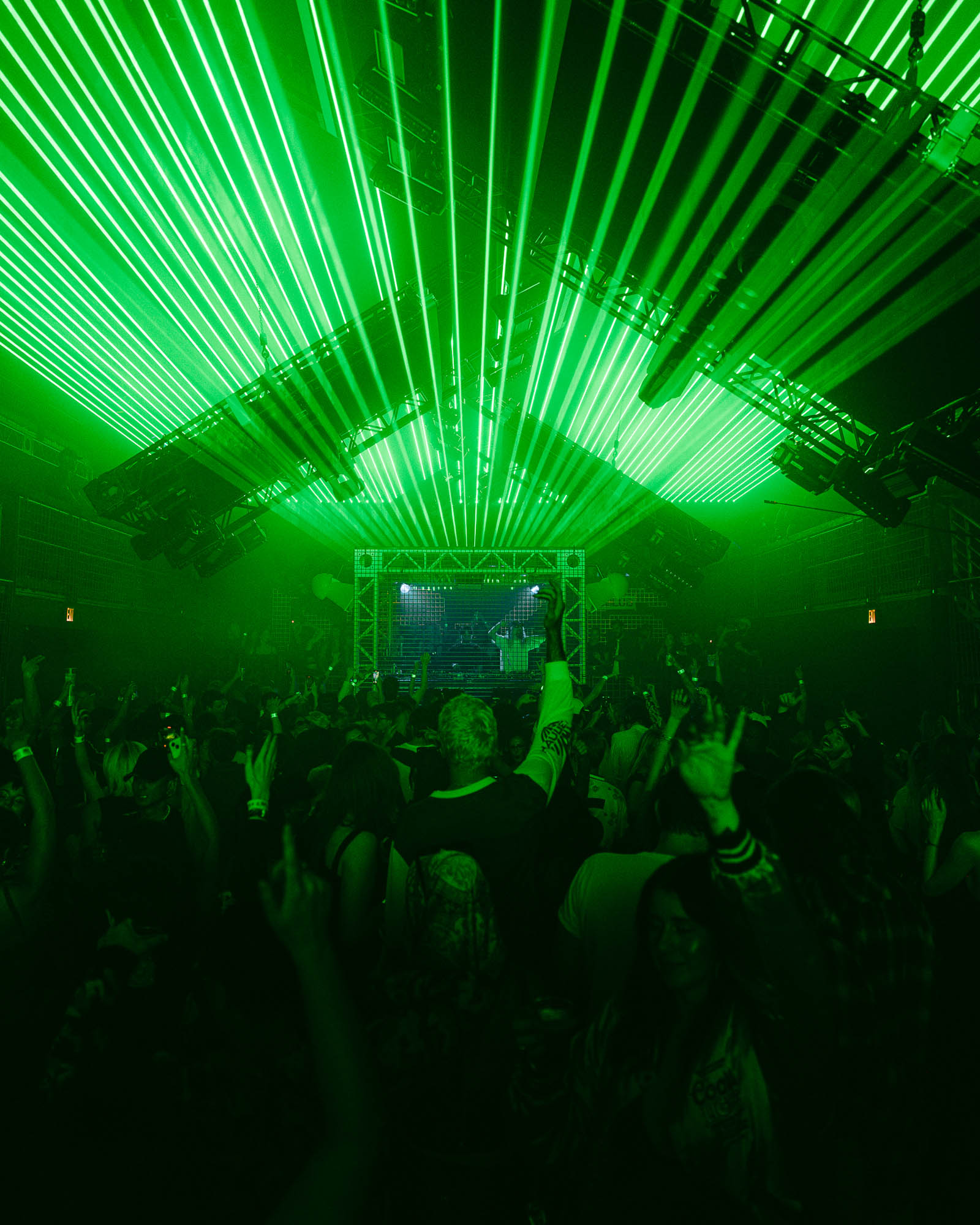Crowd at concert with green lights
