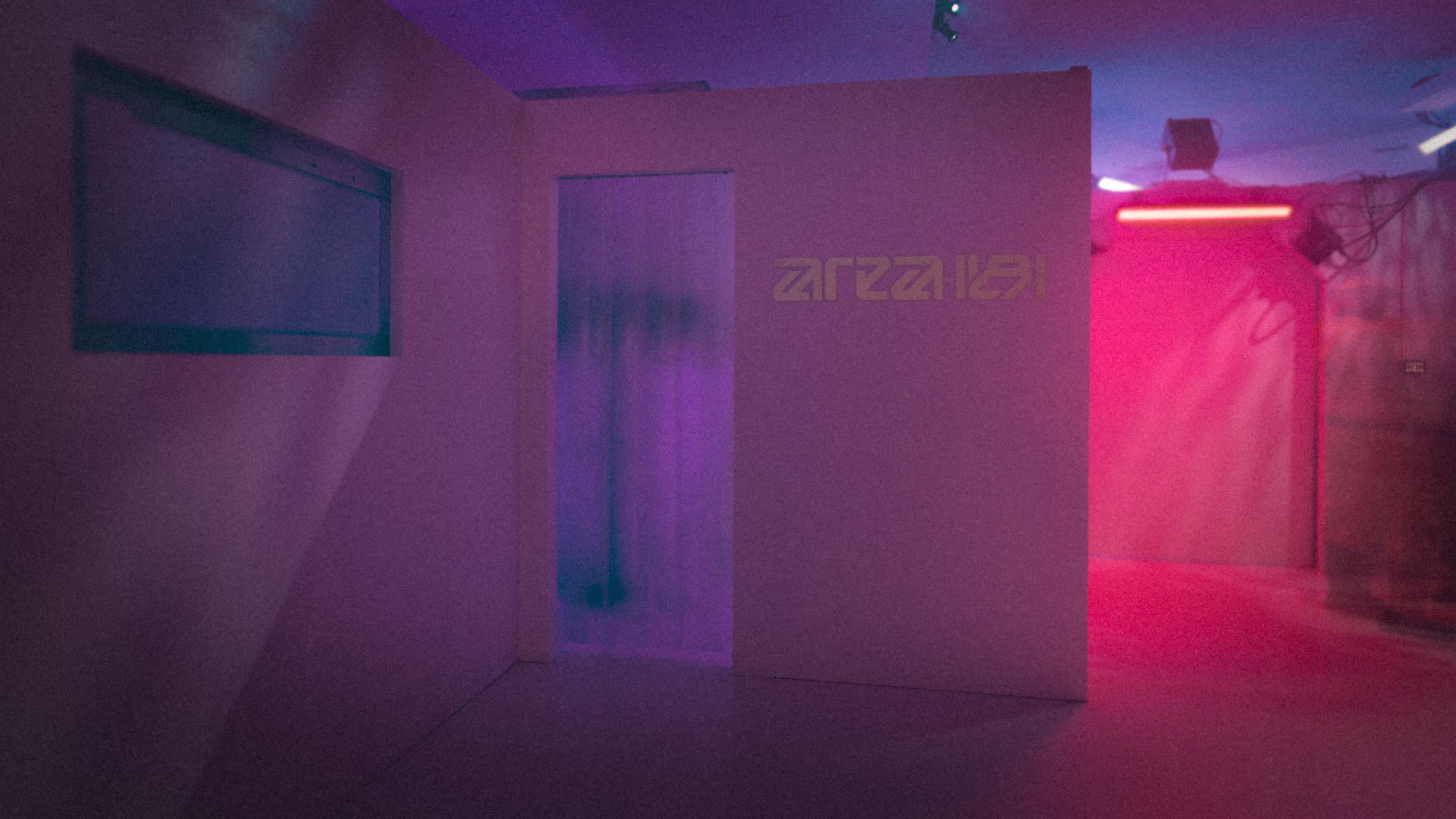 hallway with purple and pink lighting