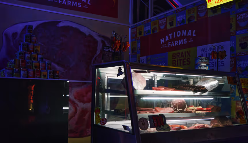A display case in a store filled with meat.