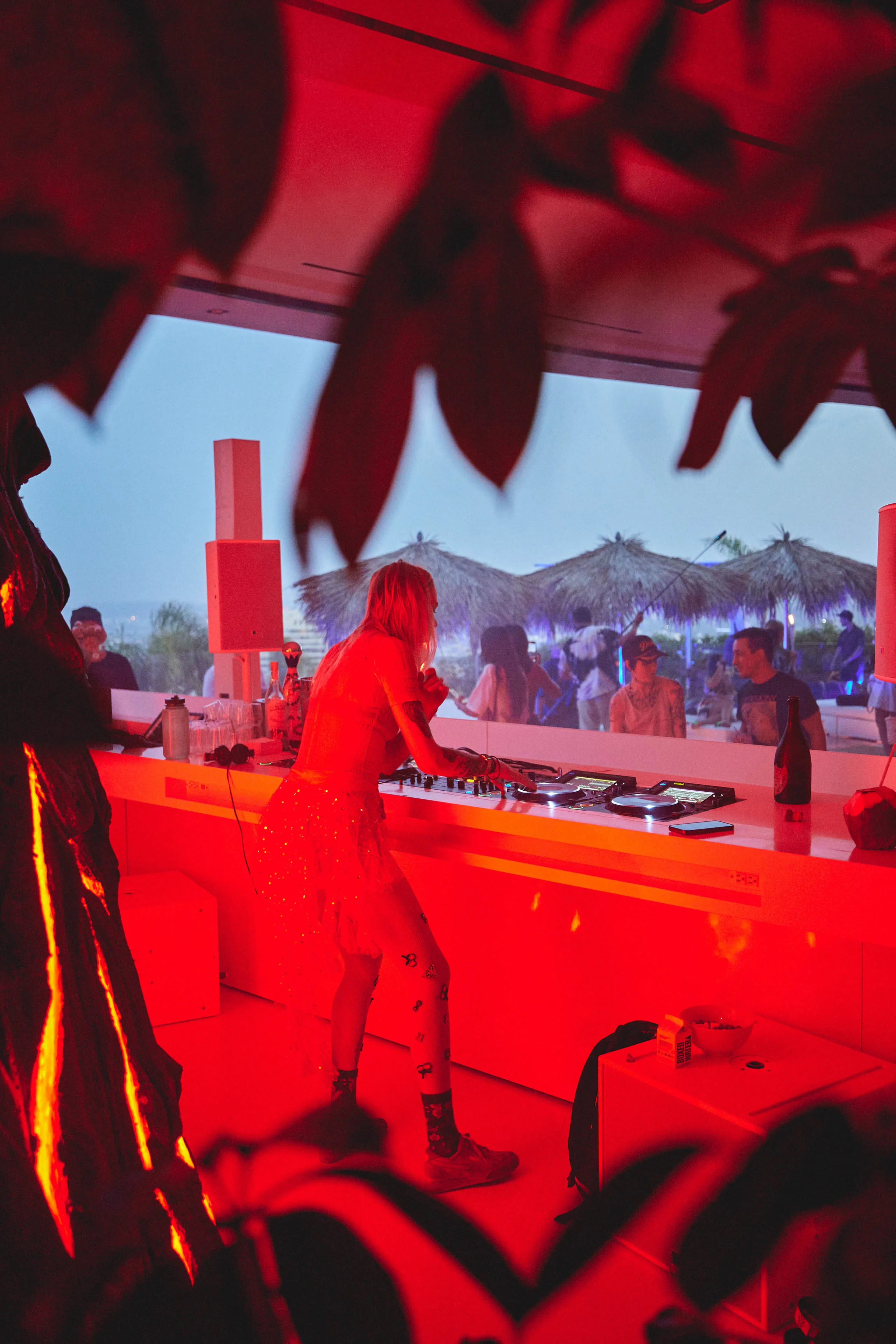 woman dj with red lighting
