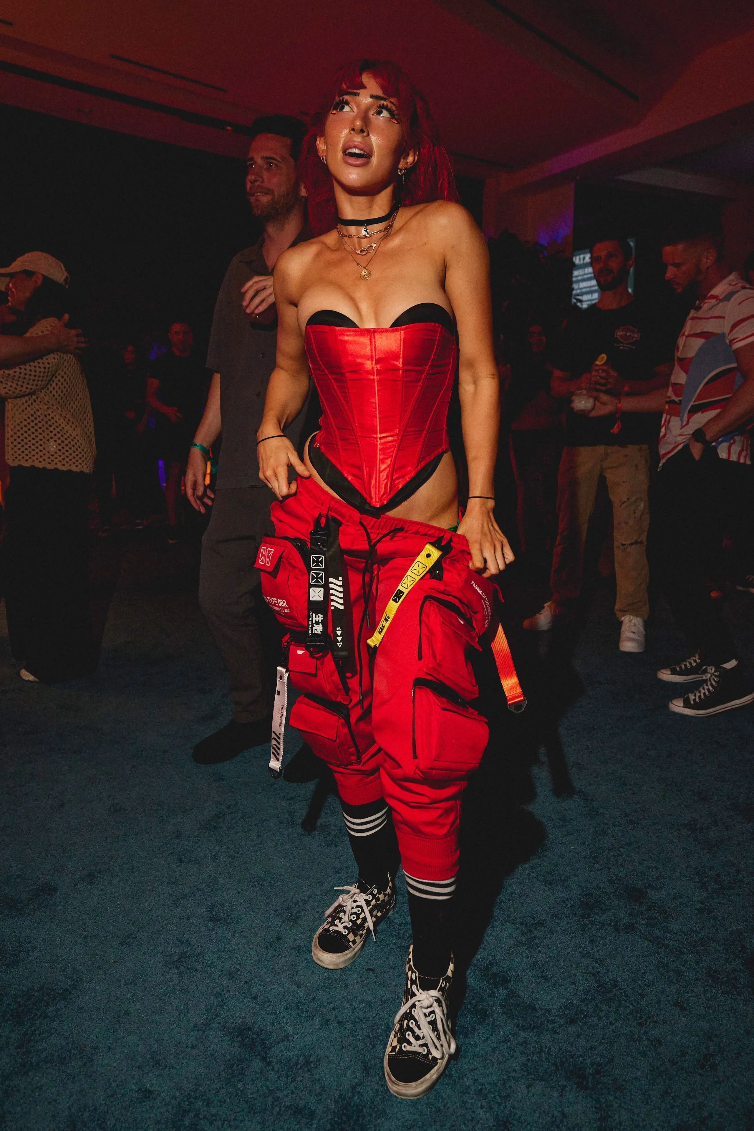 woman in red pants and red top