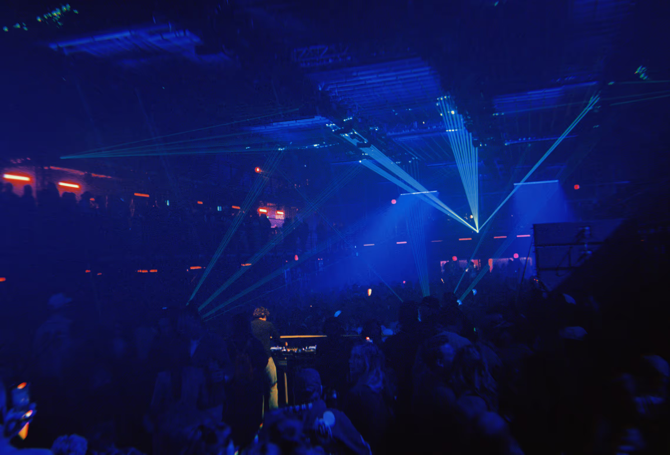 blue lighting in a warehouse rave