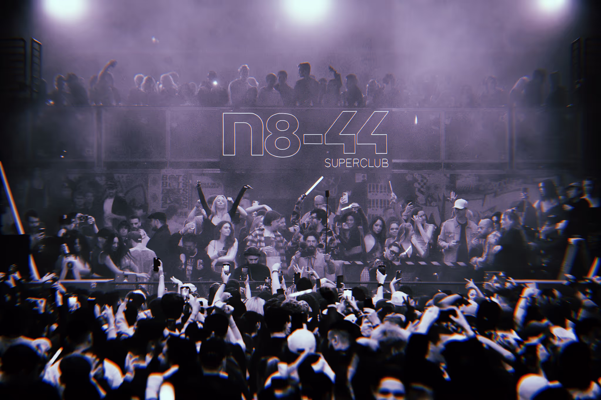black and white photograph of a warehouse rave