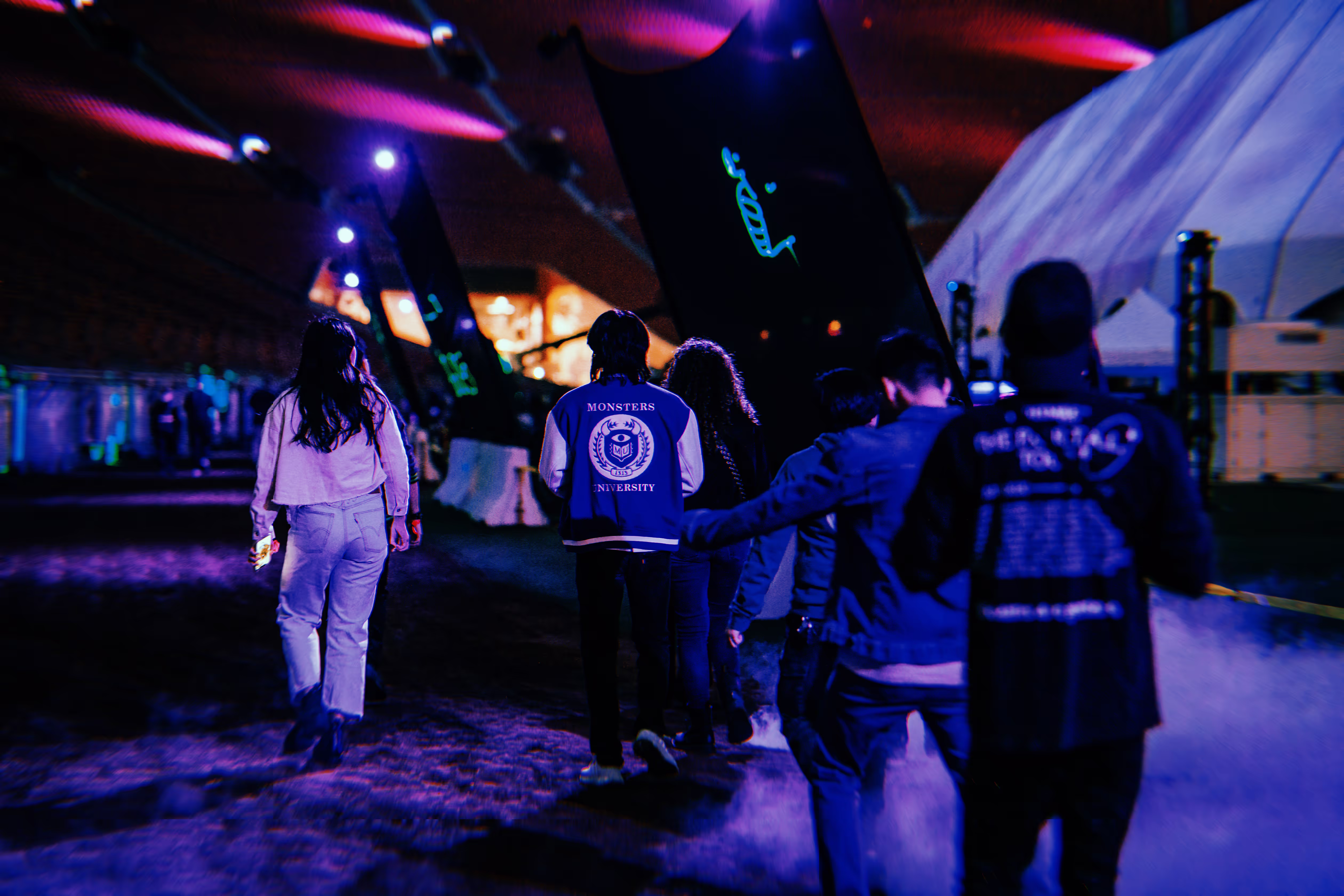 people lining up outside of a rave in los Angeles