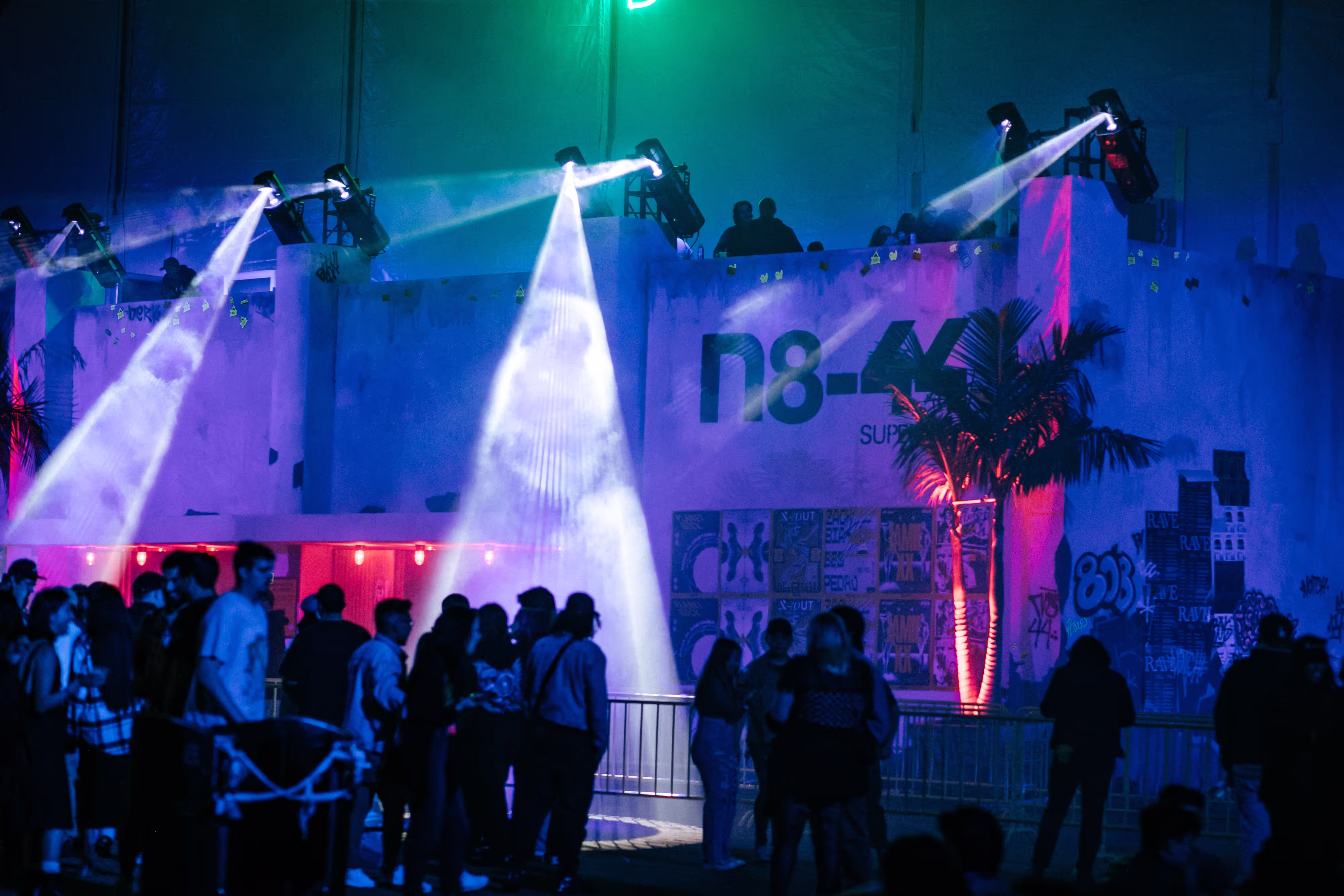 outside of rave with spotlights