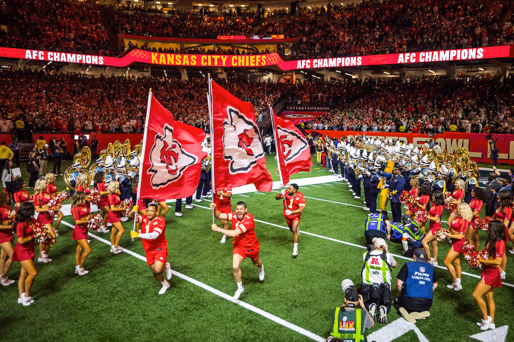 People on field with flags