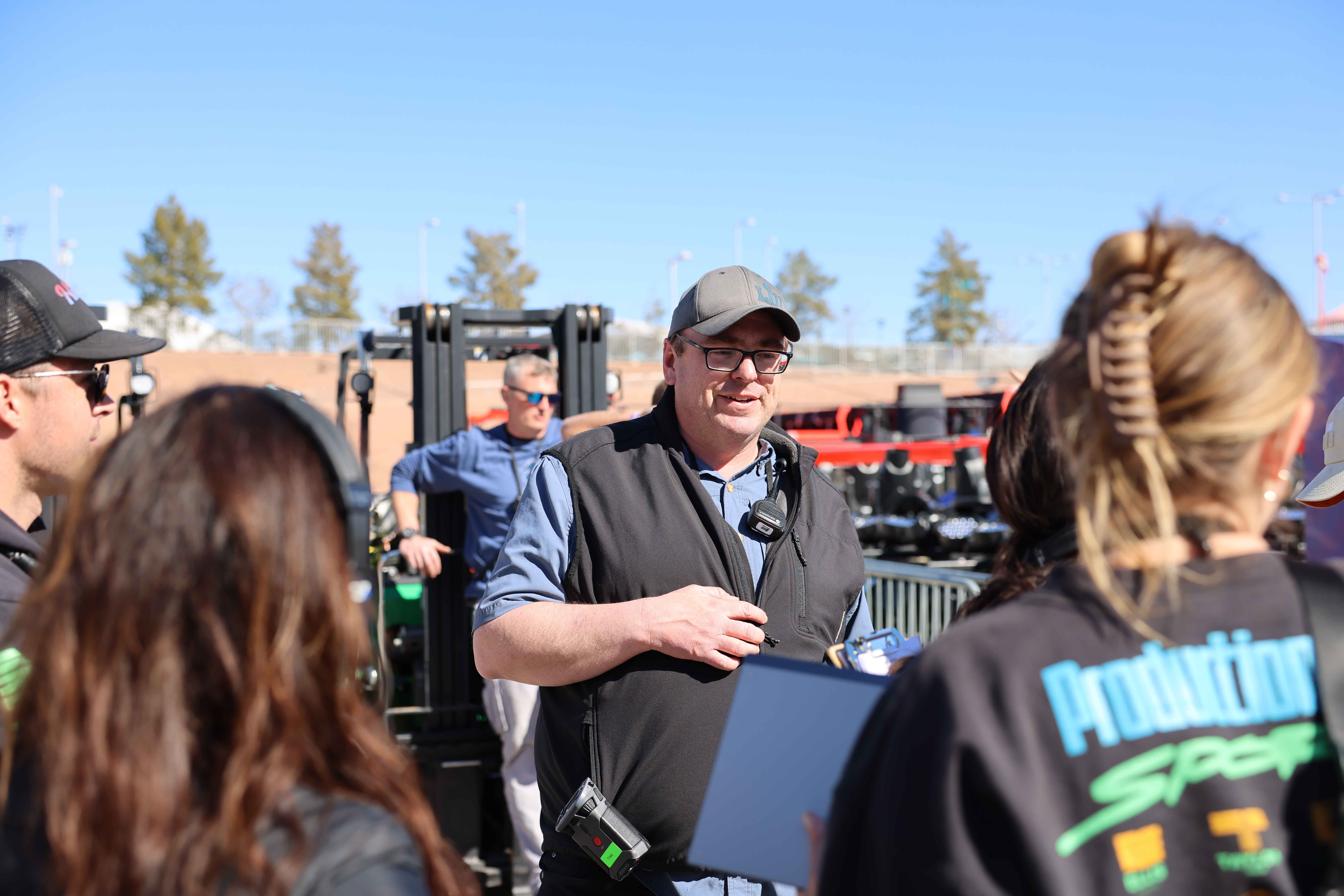 a person speaking to a group of people