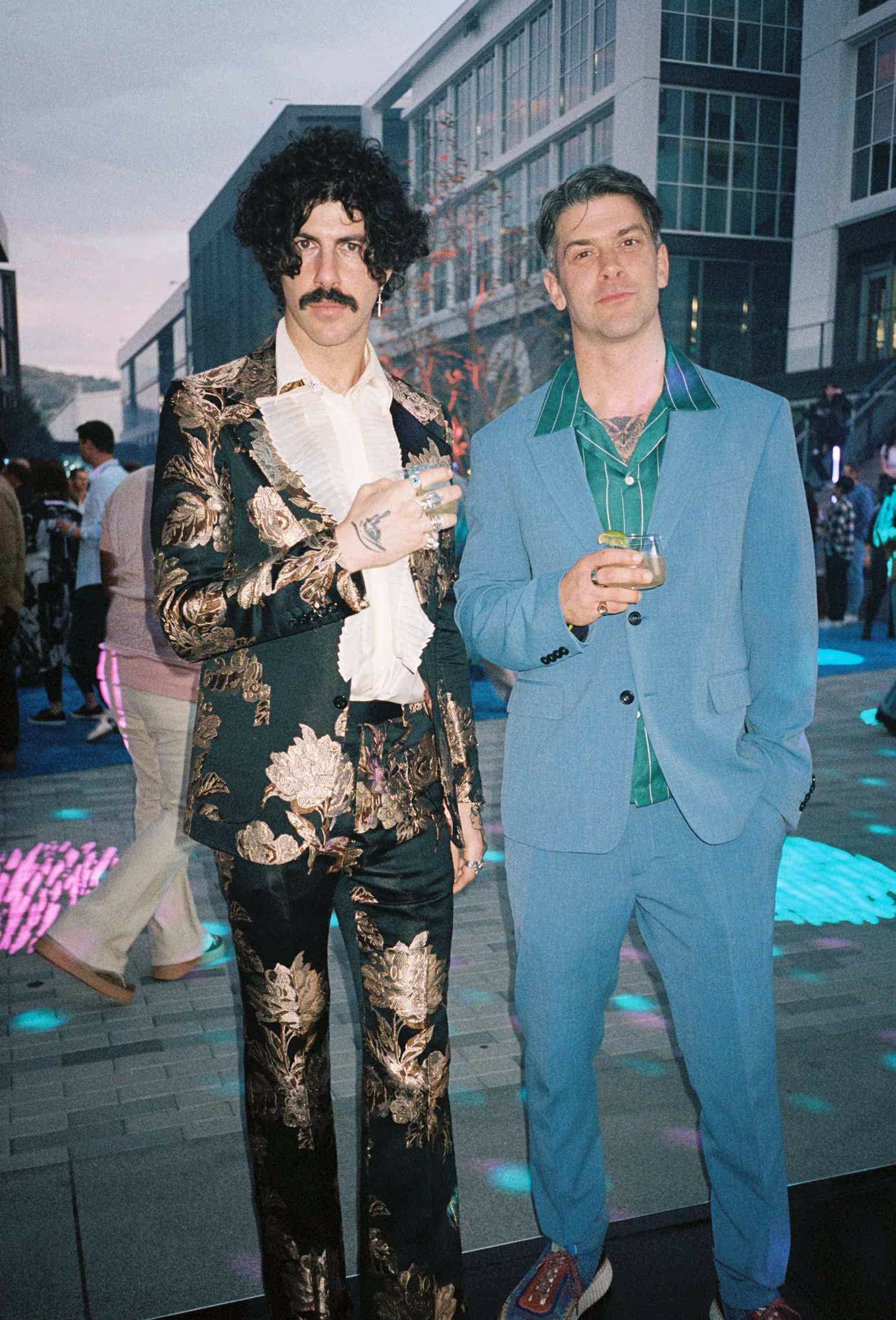 A couple of men standing next to each other.