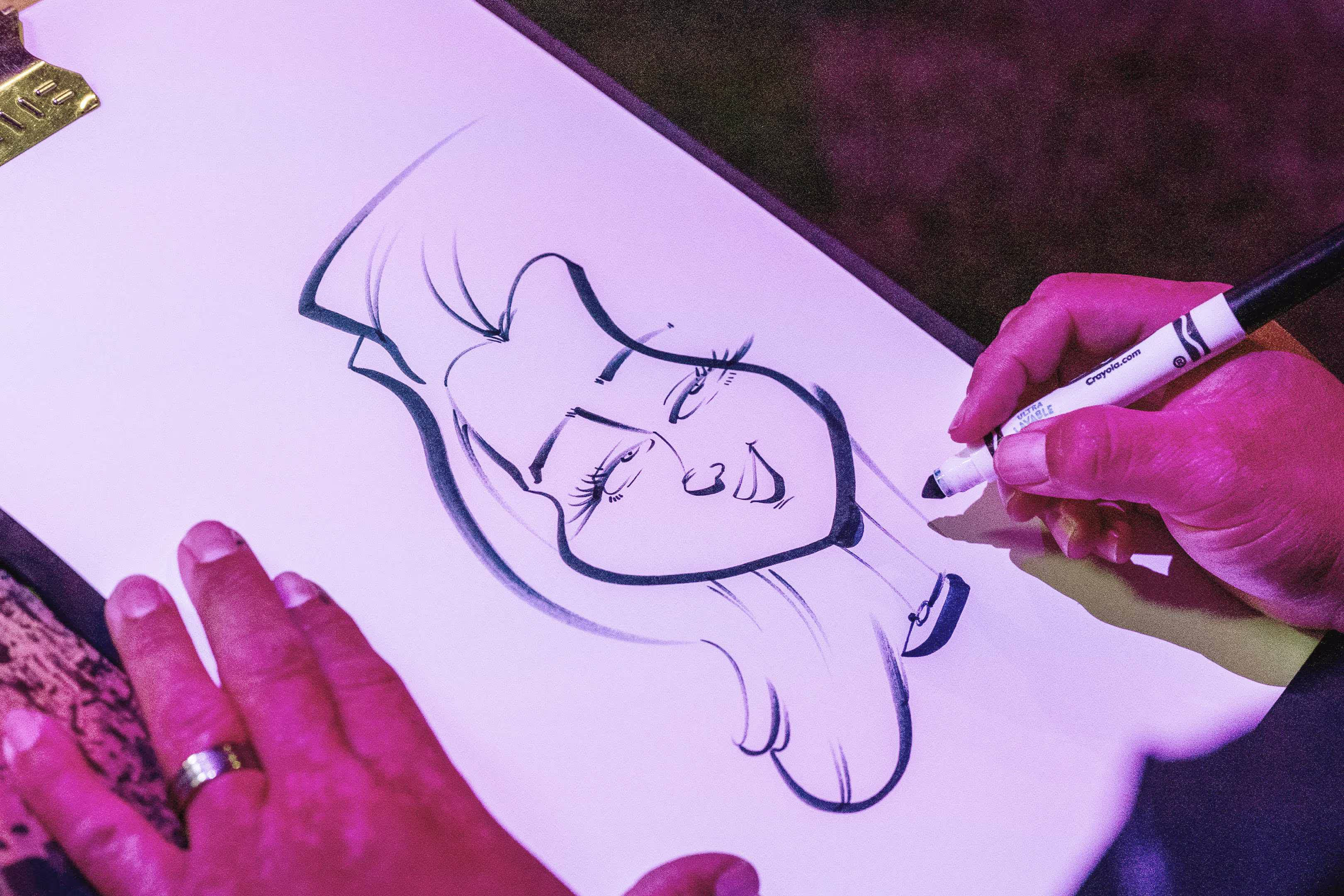 A drawing of a woman's face being drawn.