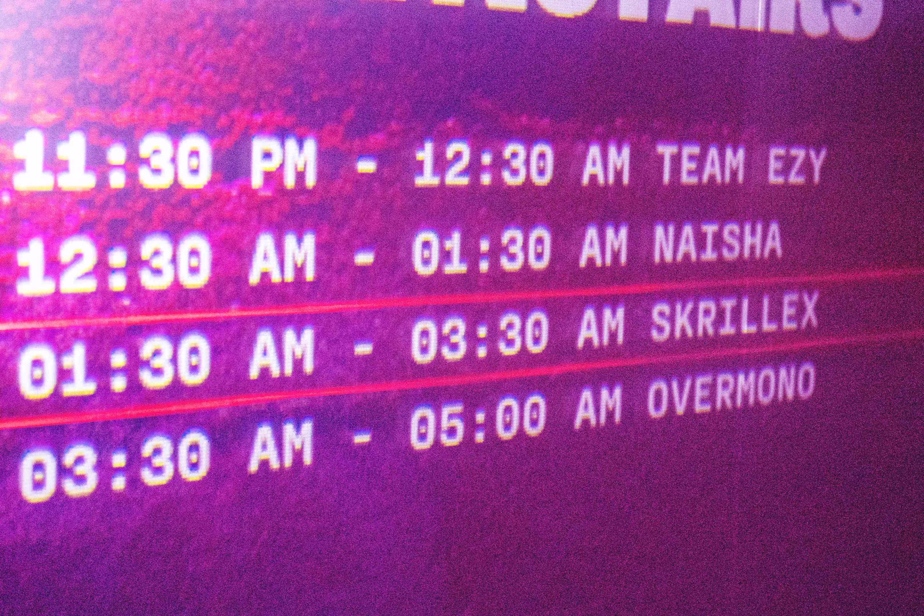 A close up of a wall with a clock on it.